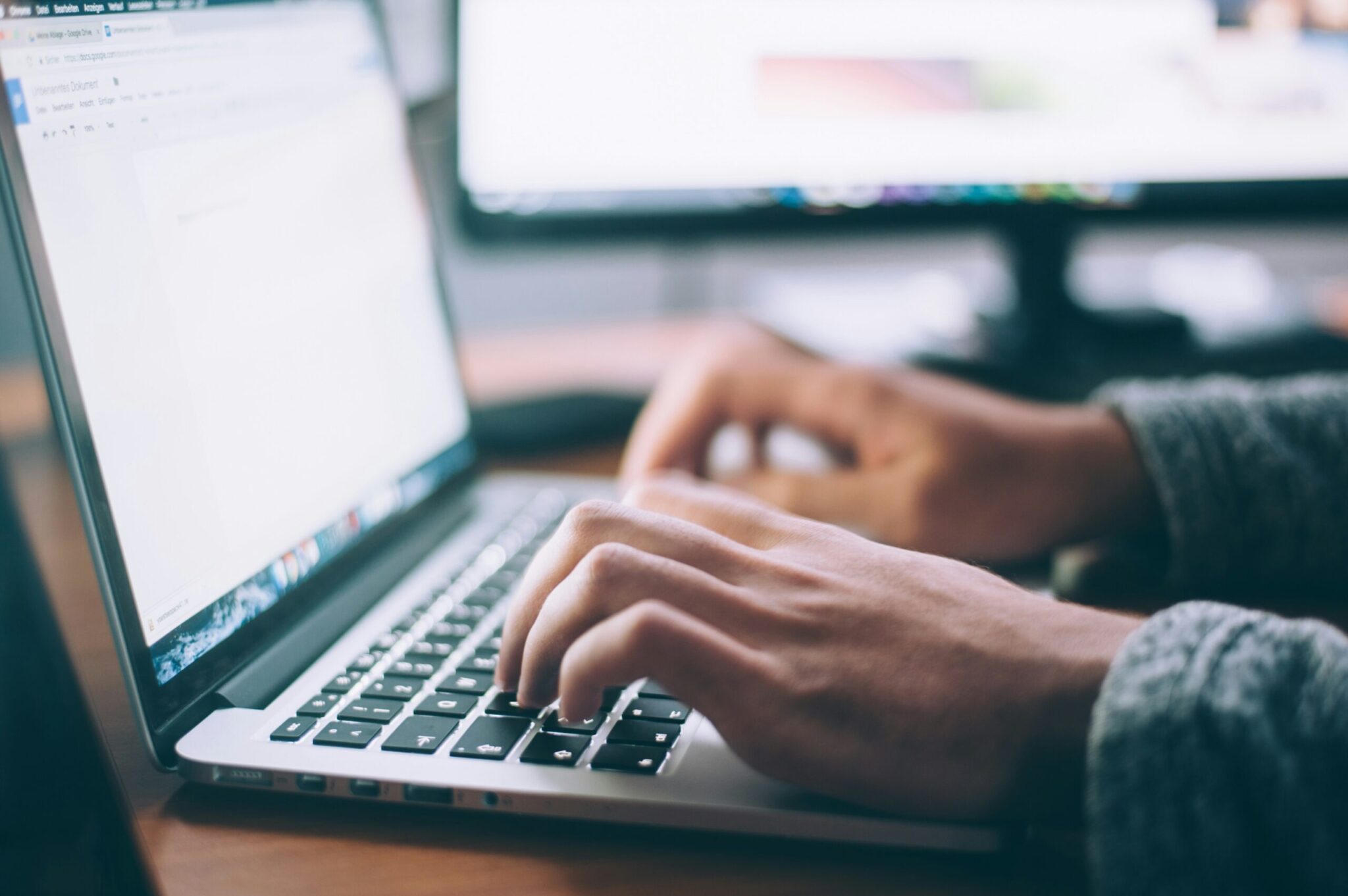 Essential-Settings-to-Maximize-Your-Microsoft-365-Experience-scaledjpg | ALCON DTS: Austin, TX Best Managed IT Support Services Person using Macbook Pro
