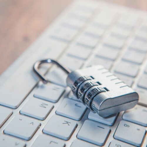 Stop-Ransomware-in-Its-Tracks_-A-5-Step-Proactive-Defense-Plan-scaledjpg | ALCON DTS: Austin, TX Best Managed IT Support Services A combination lock rests on a computer keyboard.